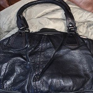 Gently used black leather Cole Haan purse.